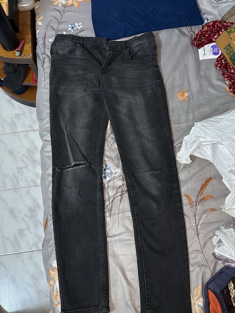 Distressed Black Denim Jeans