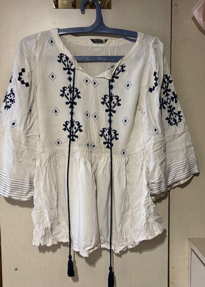White Peplum Top