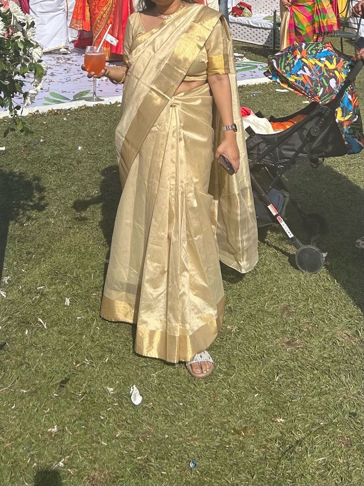 Elegant Gold Tone Saree