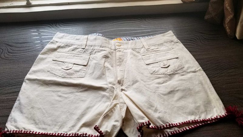 Shorts with  handwork done at thr bottom