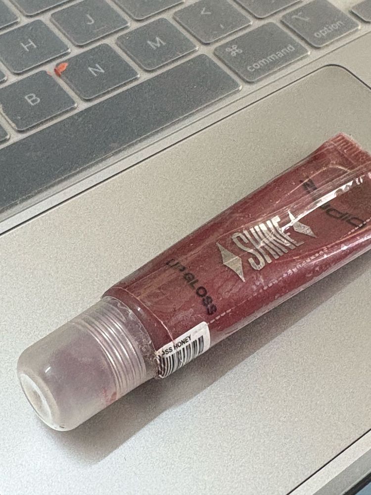 Tinted Moisturiser , Lipstick And A Lip Gloss