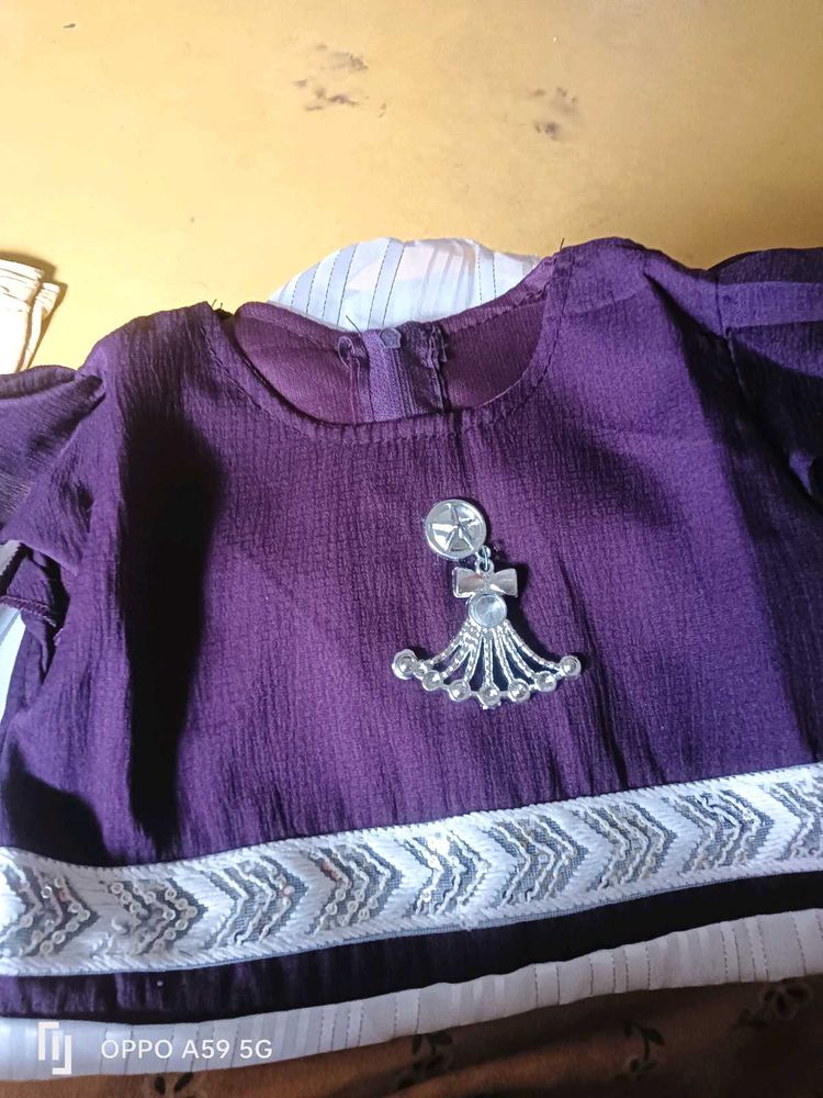 Purple Dress with Silver Embellishments