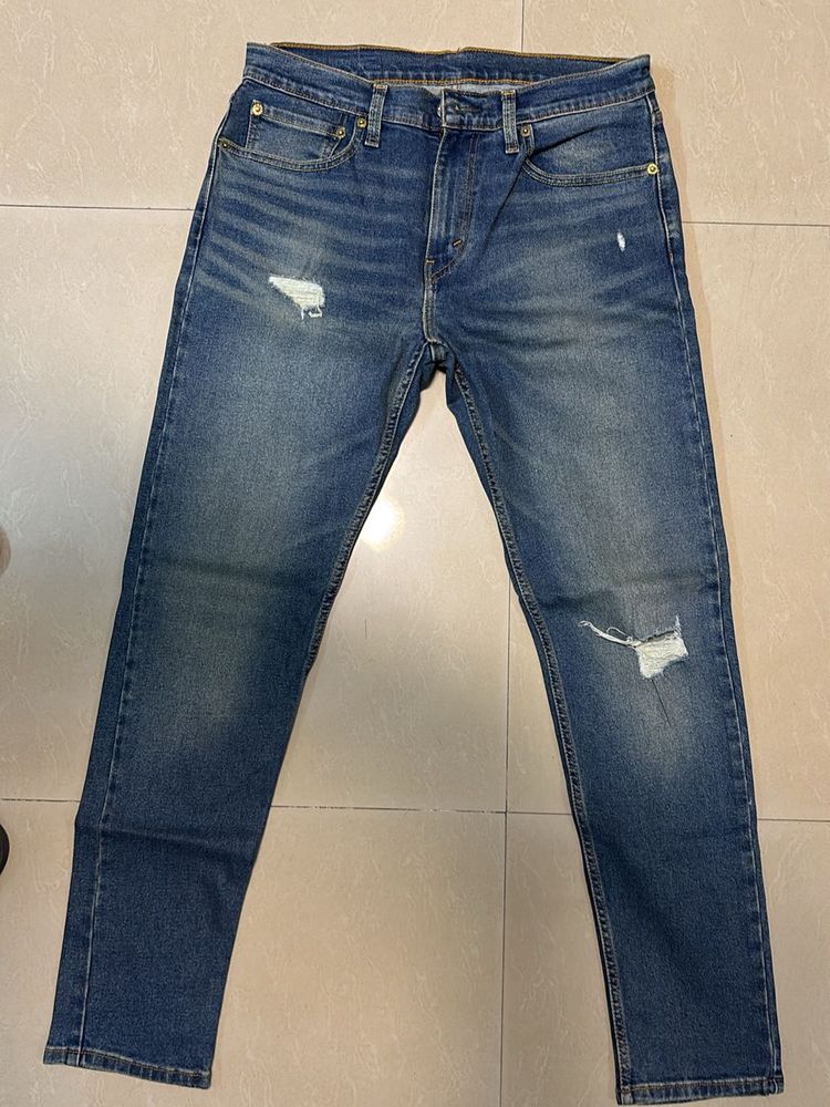 Distressed Denim Jeans