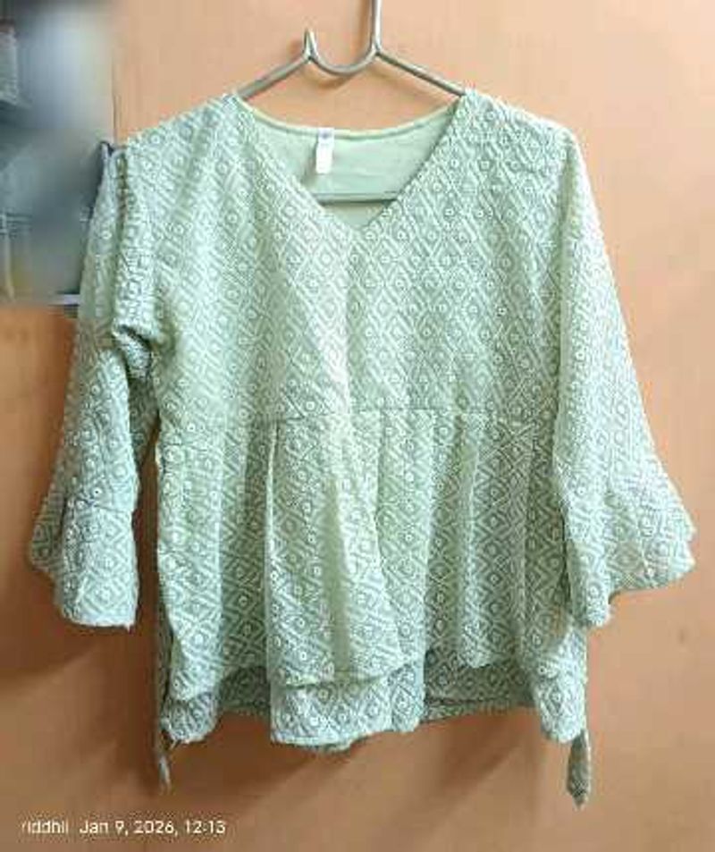 Embroidered Peplum Top