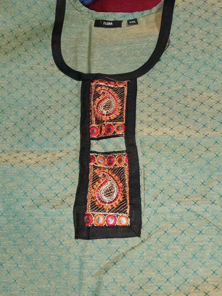 Green Embroidered Kurti with attractive design in