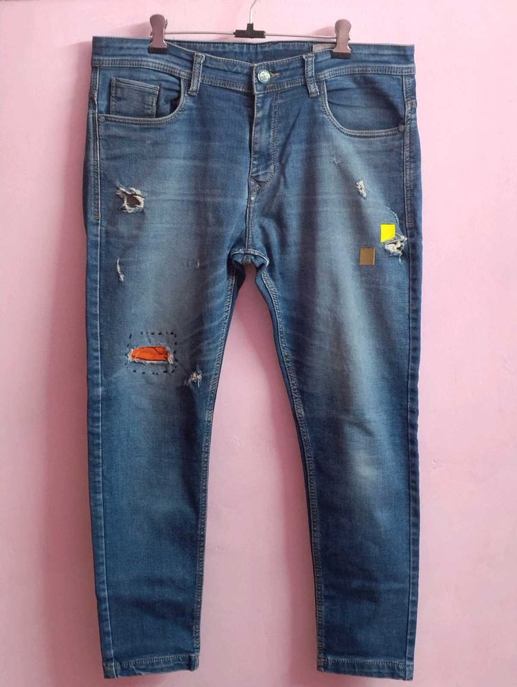Distressed Denim Jeans