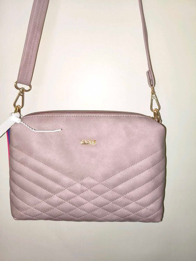 Pink Mochi Sling Bag With Quilted Front And Solid