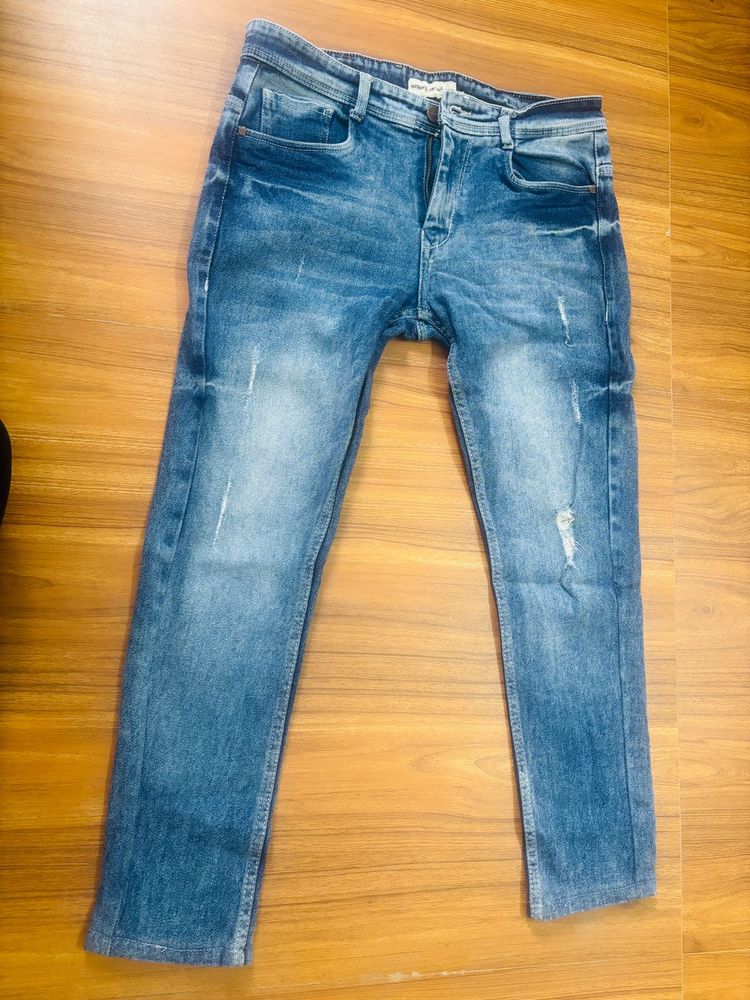 Distressed Slim Fit Jeans
