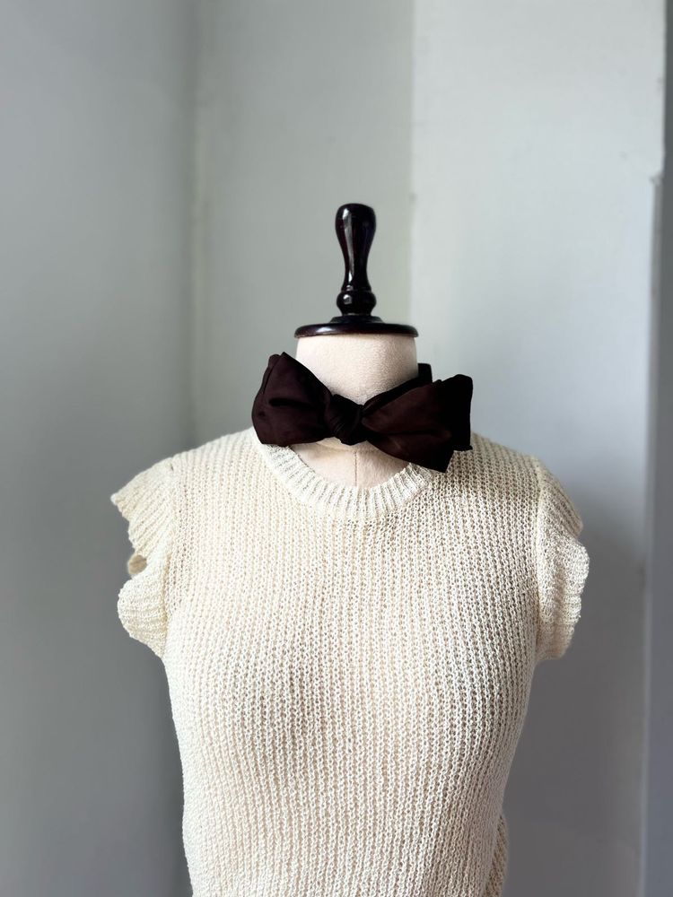 creme knit vest