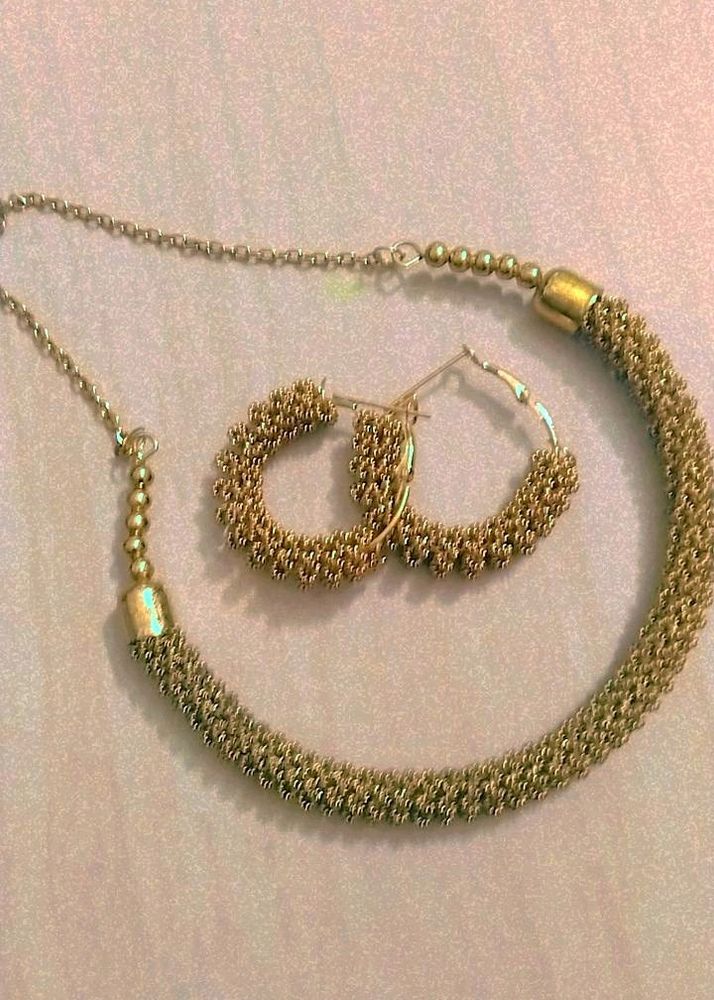 Golden Earrings And Necklace