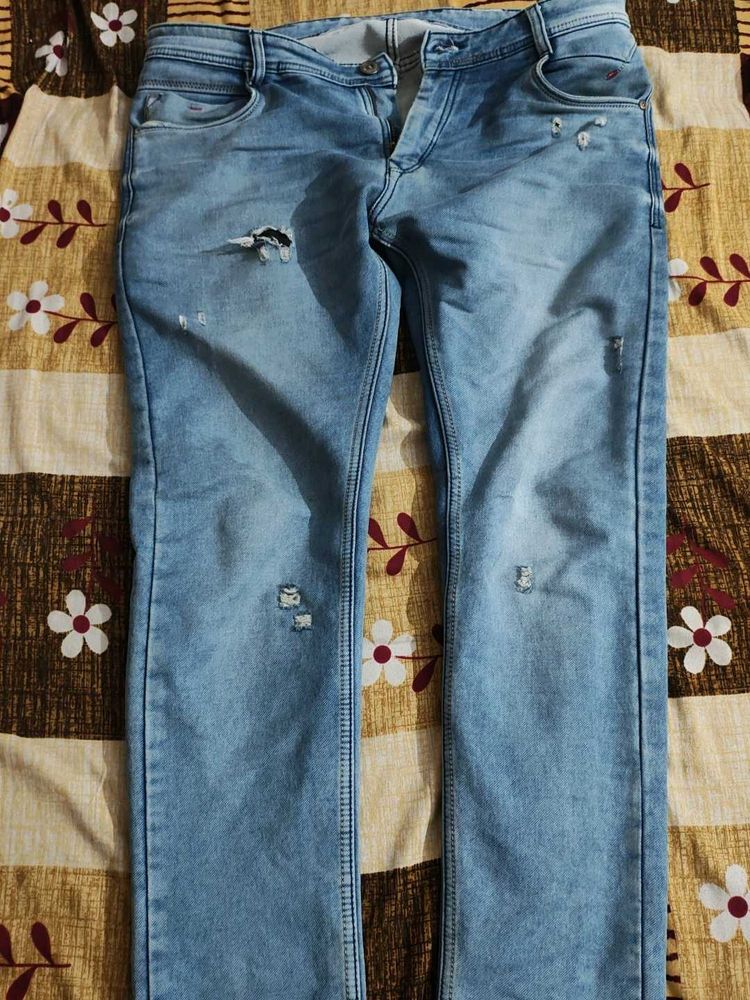 Distressed Denim Jeans