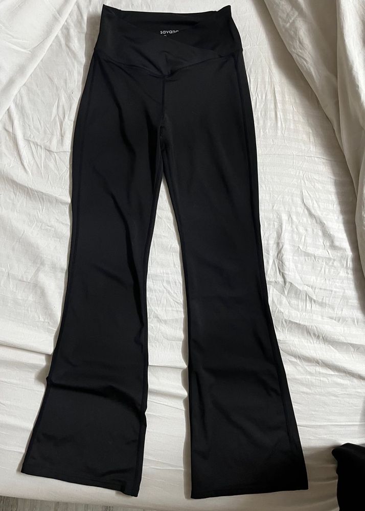 Black Criss Cross Waist Flared Leggings
