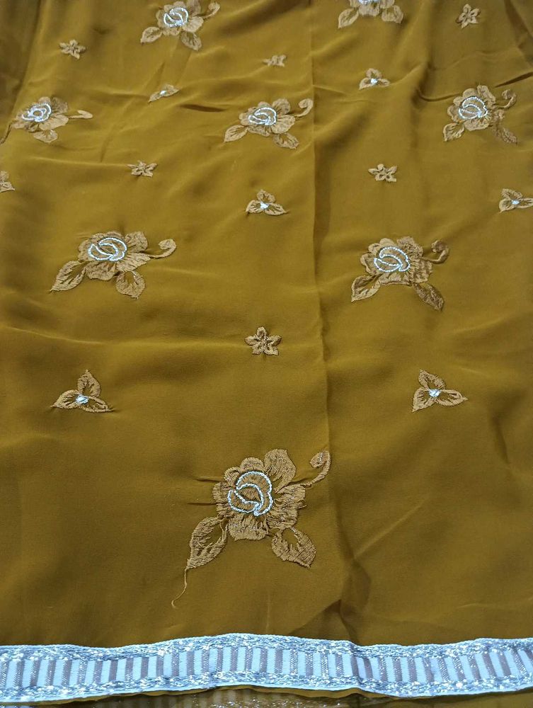 Floral Embroidered saree with stiched blouse