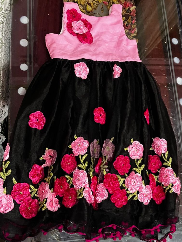 • Light pink satin fabric • Sleeveless design