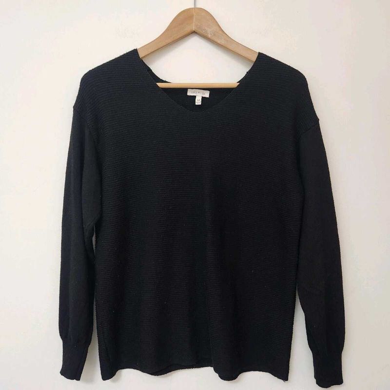A Black Full Sleeved Top for Women .