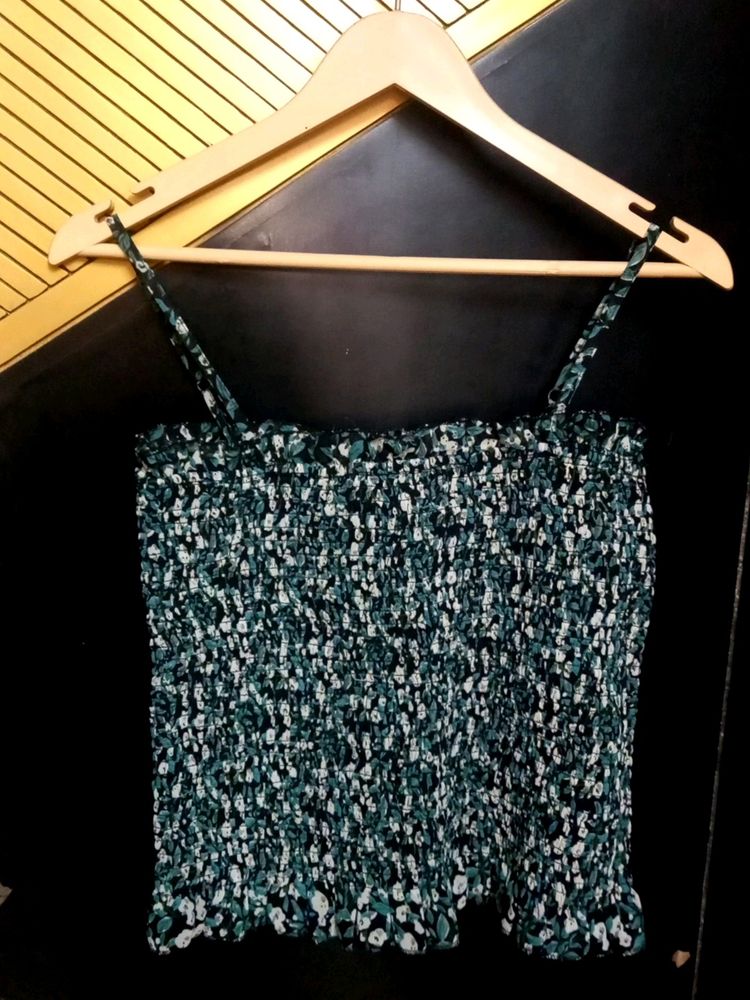 Smocked floral green sleeveless crop top