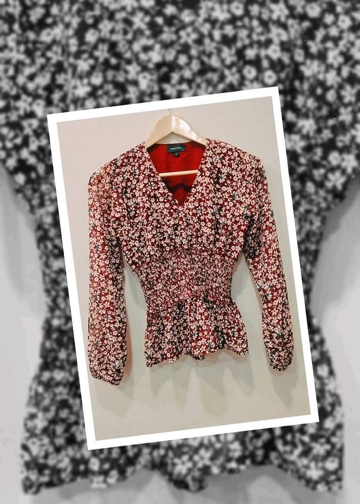 PEPLUM TOP