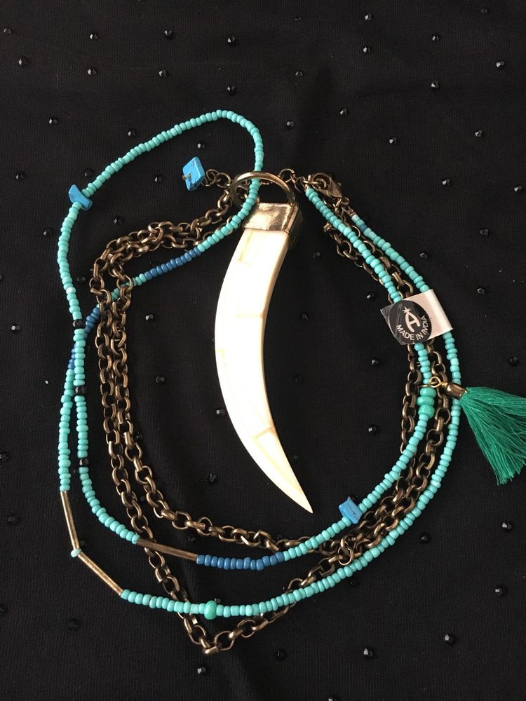 Mother of pearl claw and Turquoise beads Necklace.