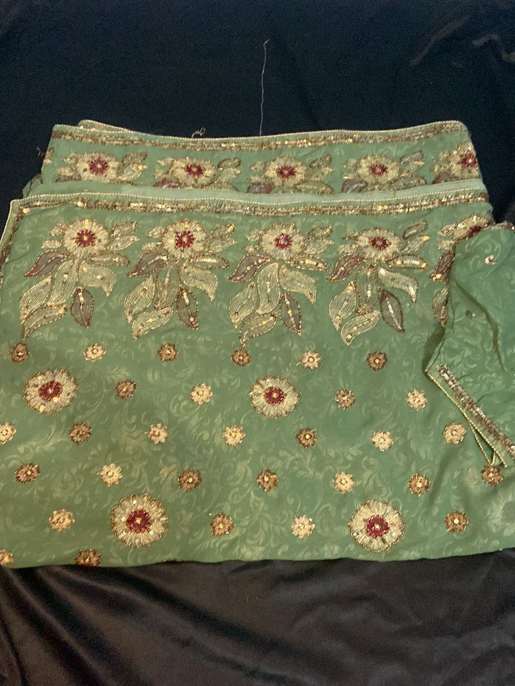 greem saree for party heavy embroidery work