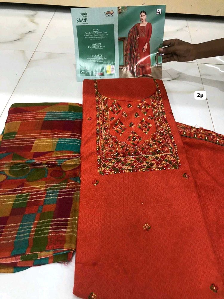 Embroidered Orange Salwar Kameez