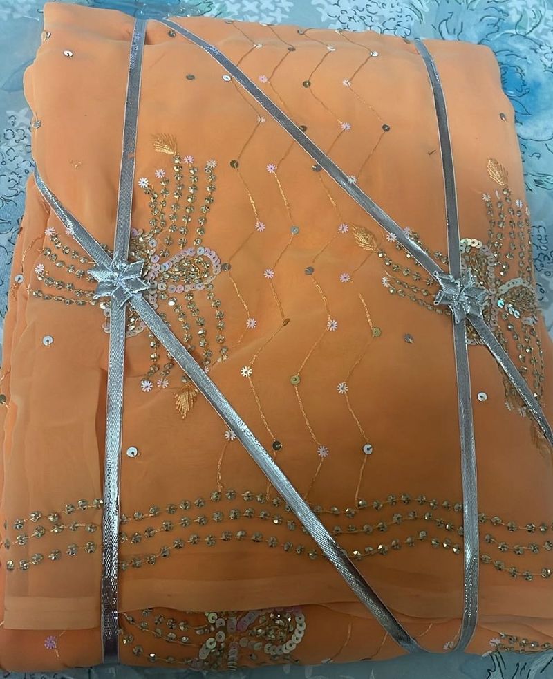 Beautiful New Packed Saree. Orange Peach Colour
