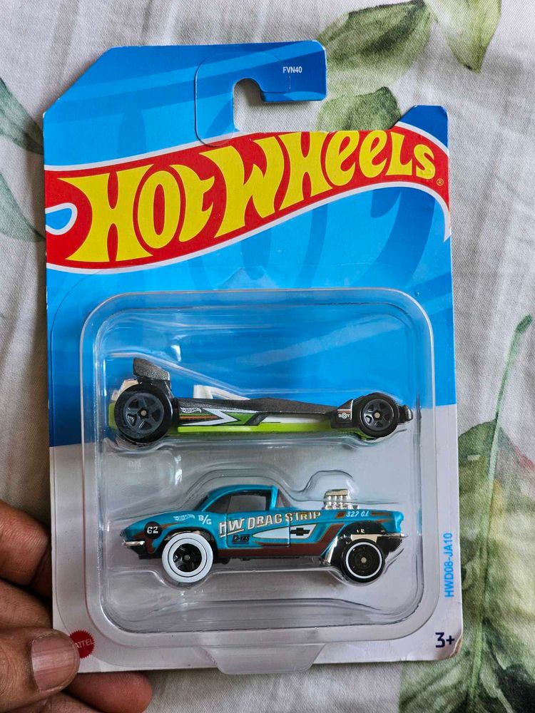 Two Hot Wheels cars, factory-sealed and brand new