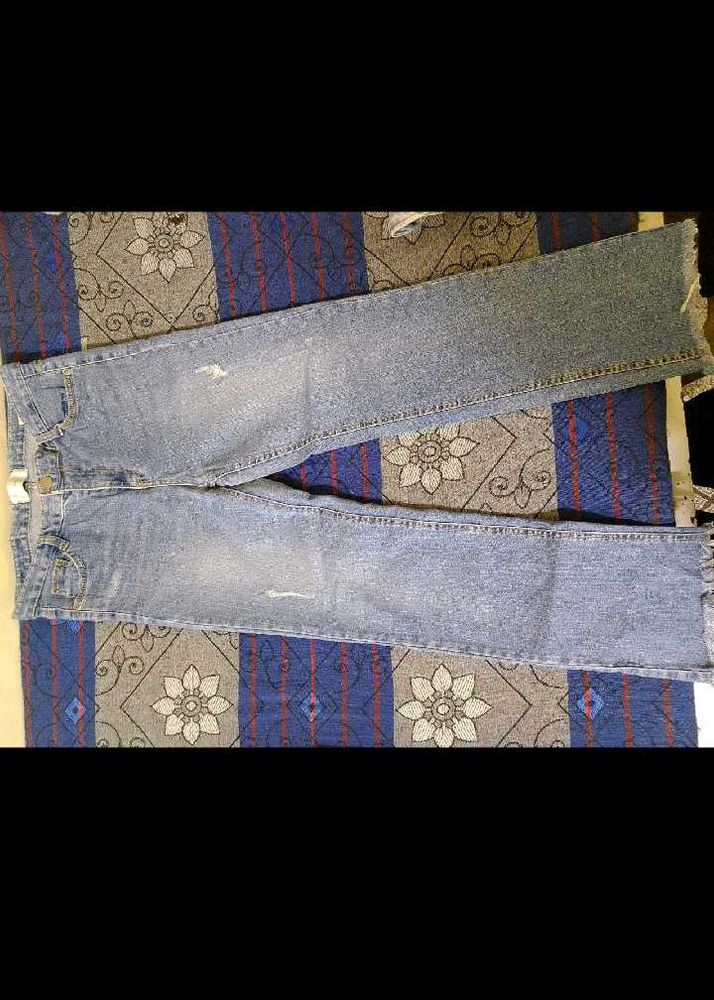 Distressed Light Wash Denim Jeans