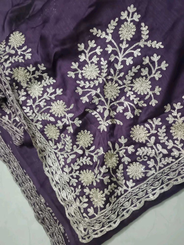 Purple saree with emrodary work