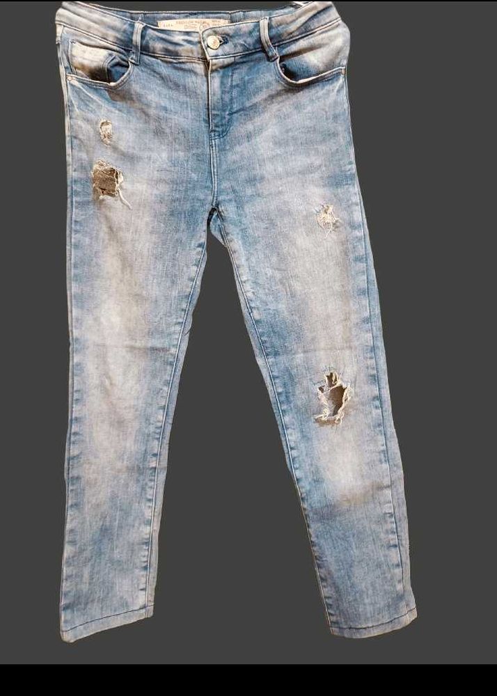 Distressed Light Wash Skinny Jeans
