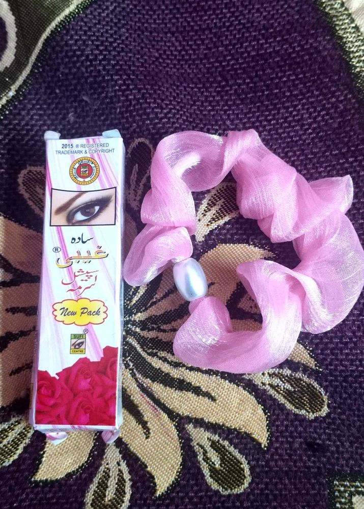 Surma With Hair Rubber