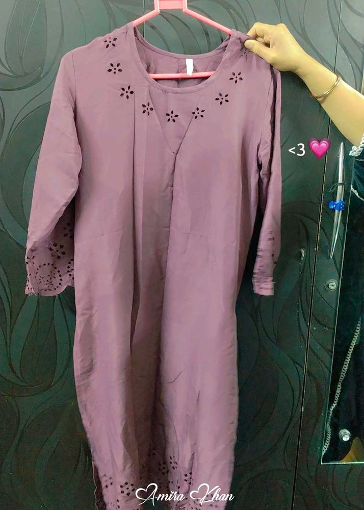 A Purple Colour Kurti With Pant