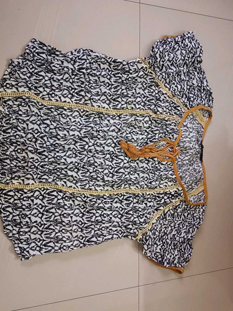 Casual too. Mix of Rayon and Polyester.