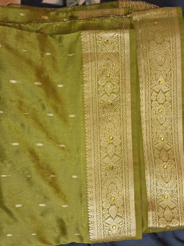 Olive green kanjeevaram saree