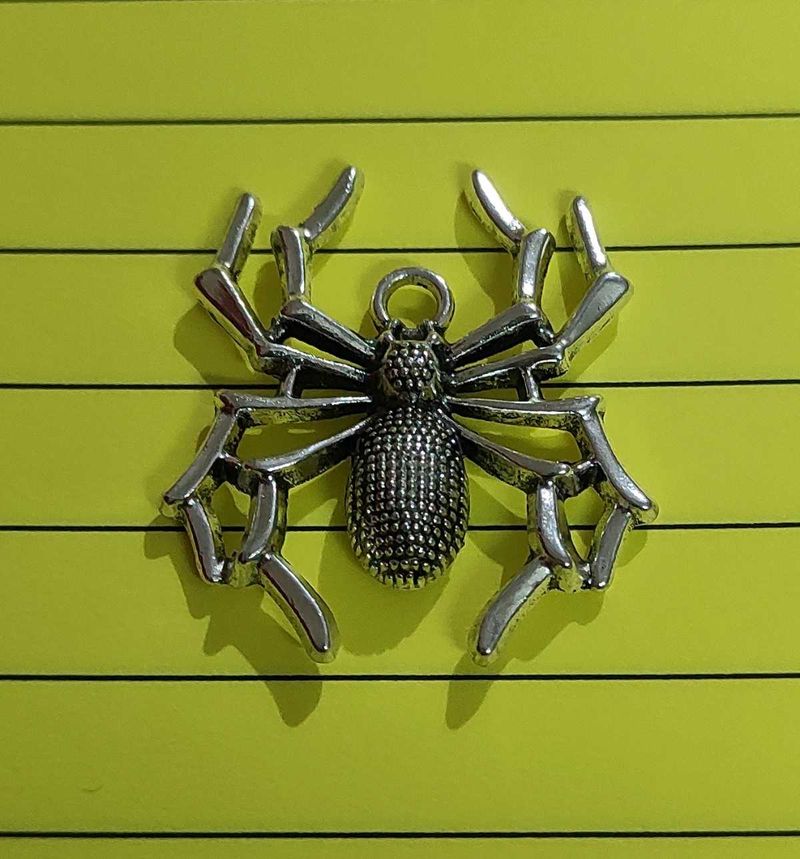 A Spuder Steel Pendant