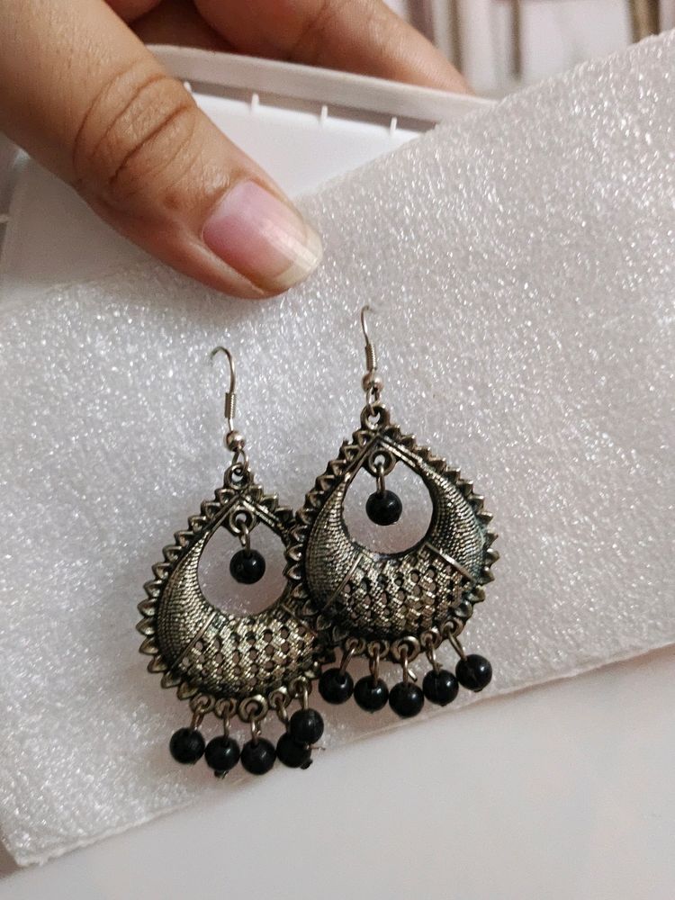 Silver Pair Of Earrings To Wear With Ethnic Wears