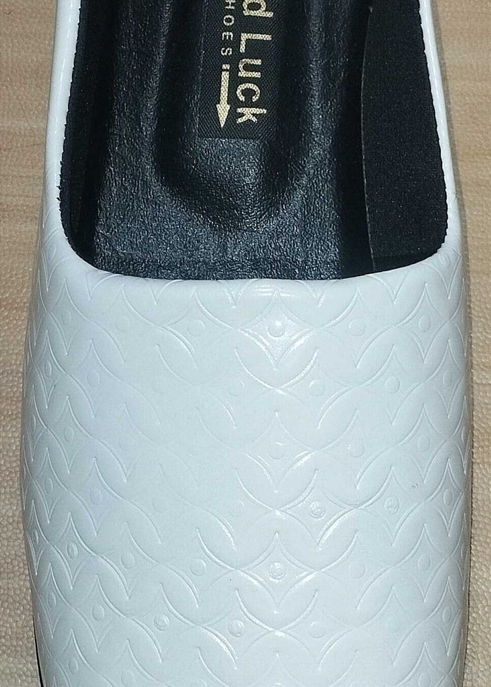 White Nagra slip-on shoes