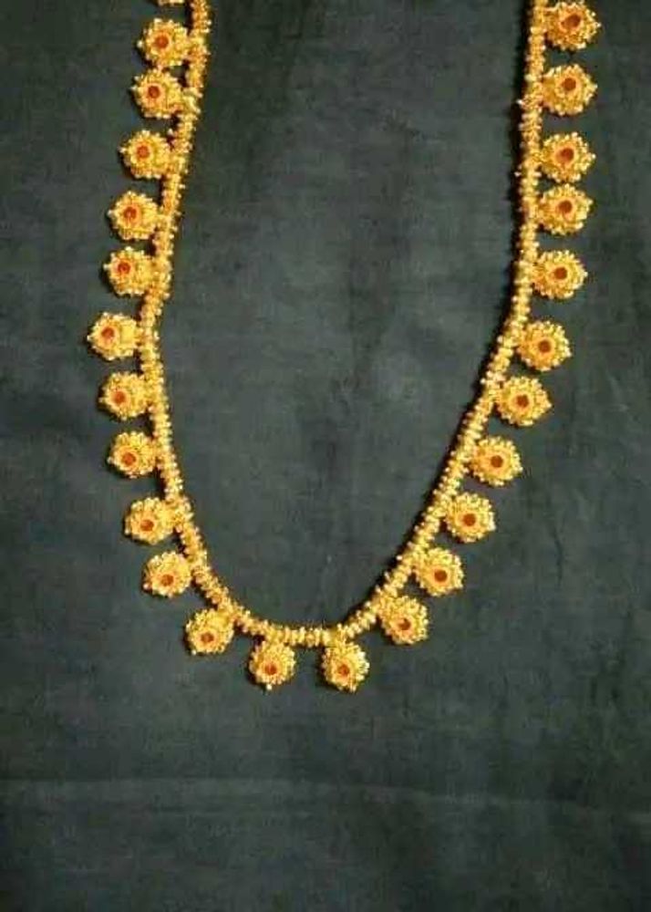 Manipuri gold thapak