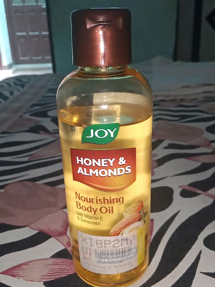 Joy Nourishing Body Oil With VITAMIN E And Sunscreen