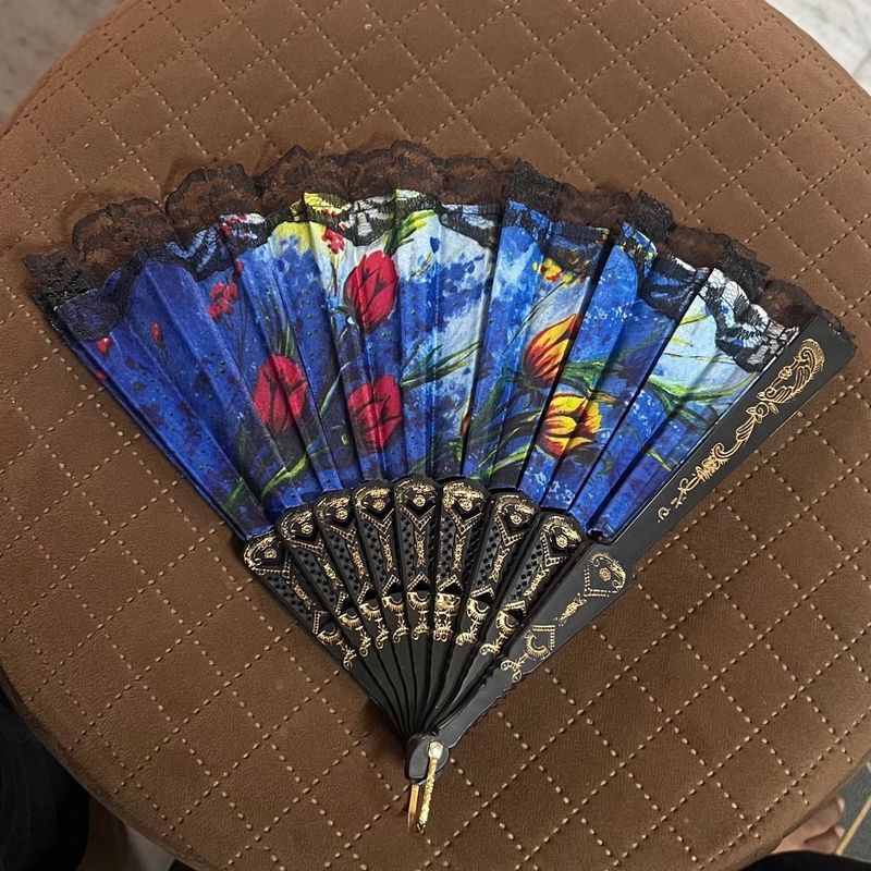 Elegant Handheld Decorative Fan with Floral Design