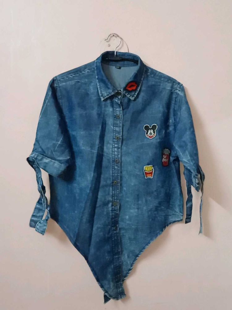 Denim shirt with patches