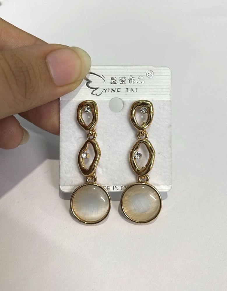 White Pearl And Golden Earrings