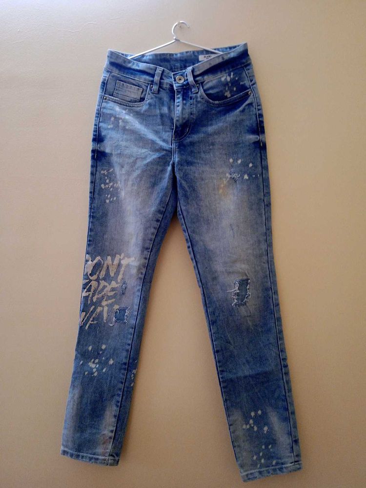 Distressed Denim Jeans