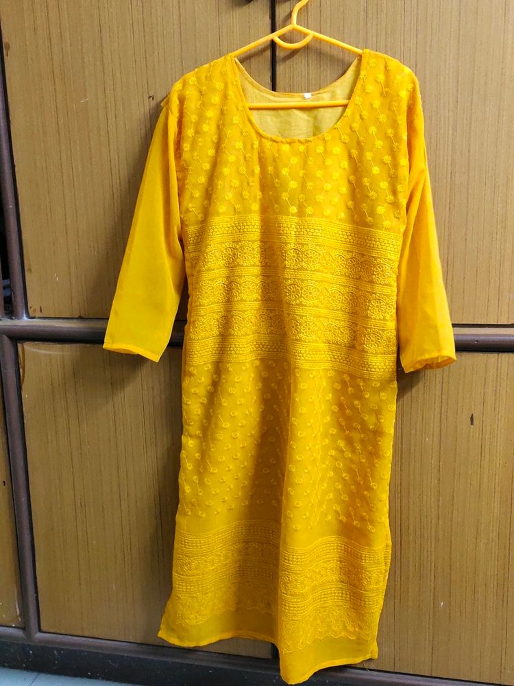 Limited Period Offer !!!Yellow Embroidered Kurti