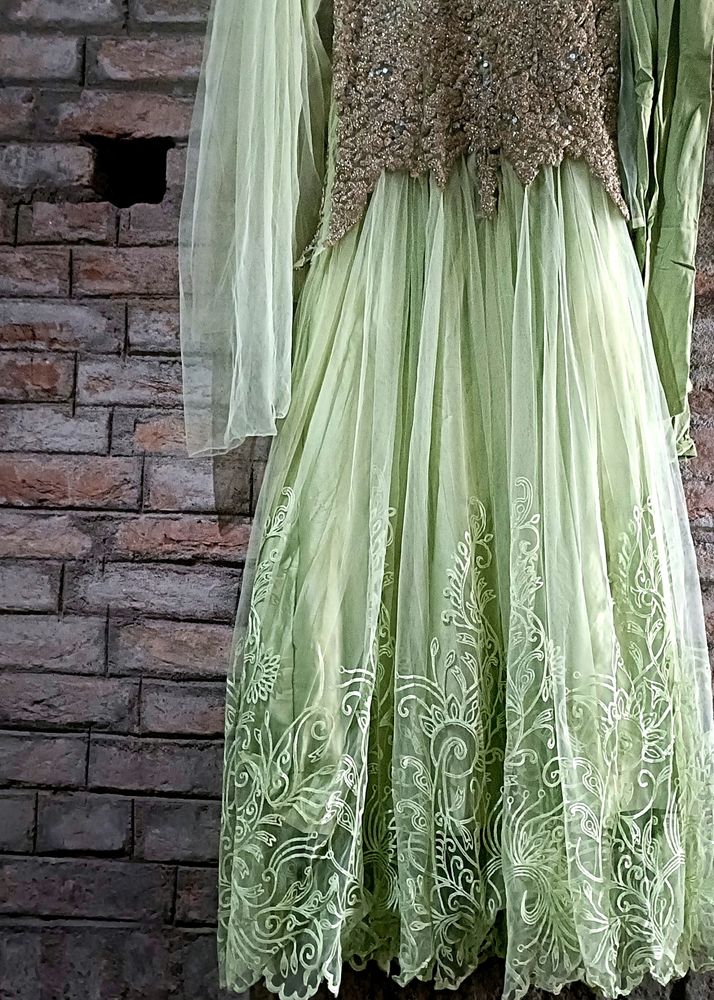 Heavy Embroidered Net Party Wear Long Gown With Du
