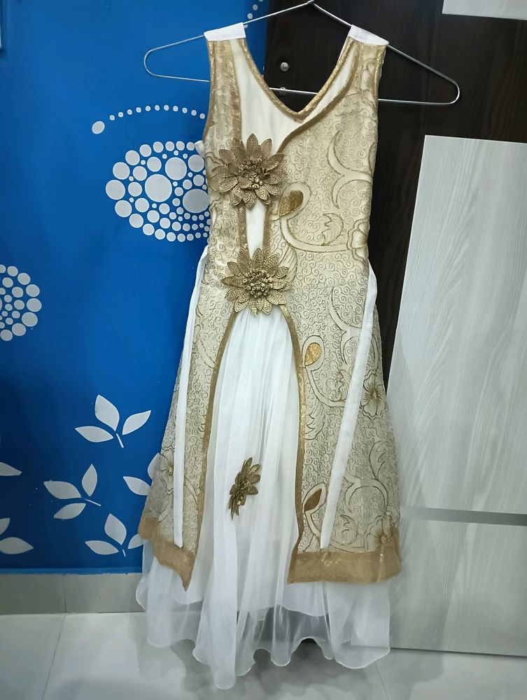 Beautiful white dress with golden flower work