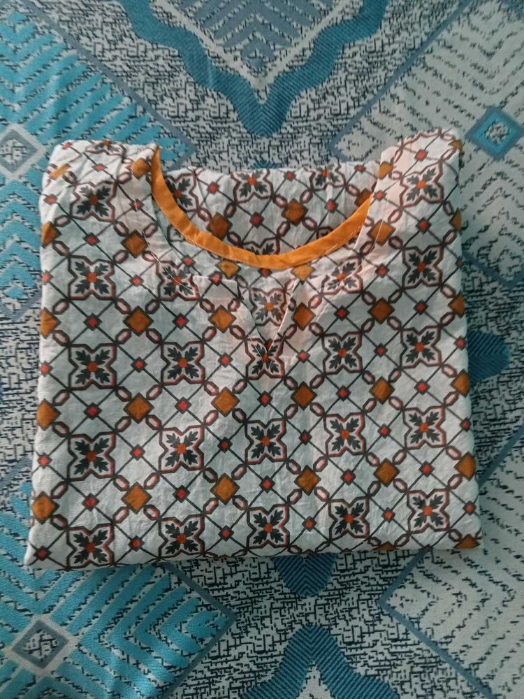 Beautiful Yellow And White Short Kurti