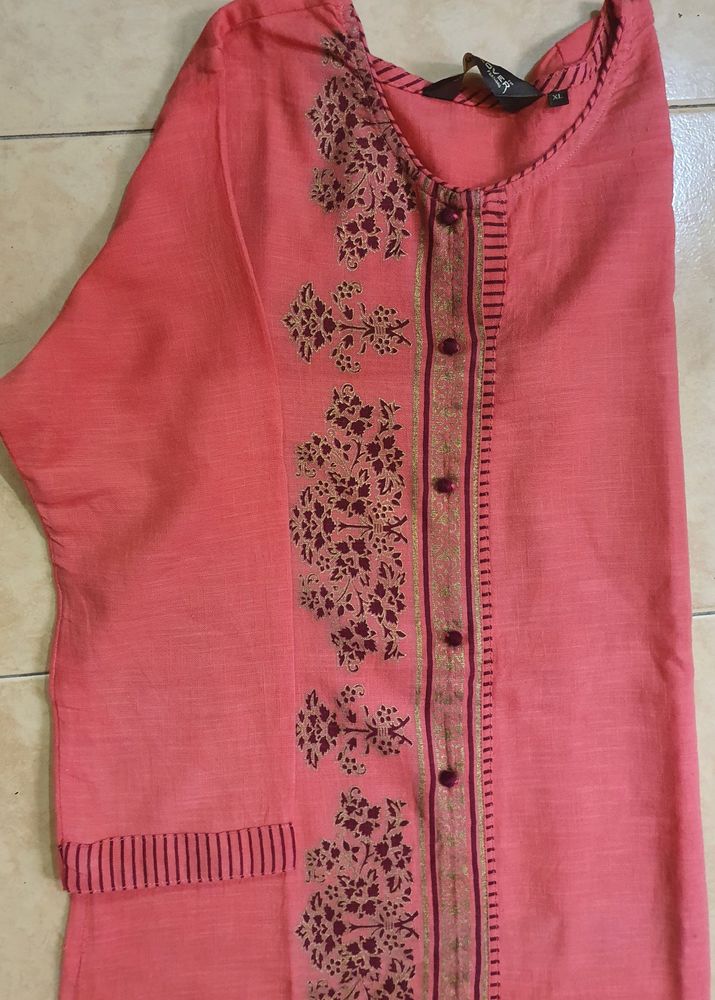 Dark peach color top with foil prints in the middle