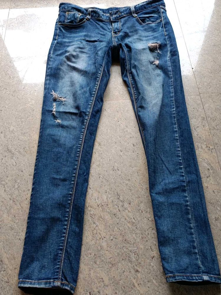 Ripped Blue Denim Jeans