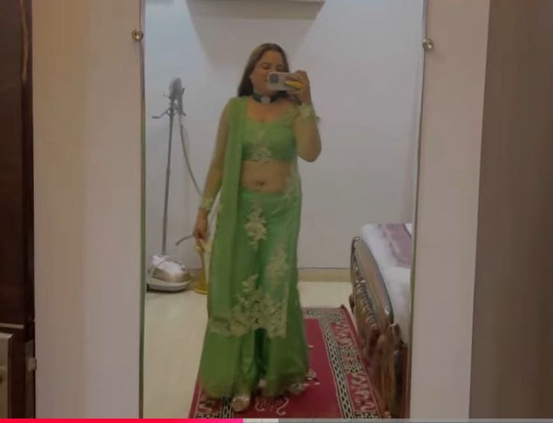 green shrara with long cap