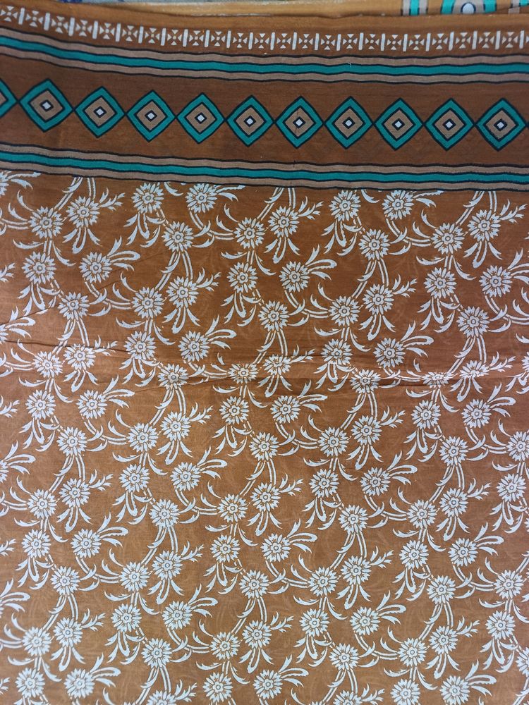 Pure Cotton Saree, In Daek Brown Colour. Best Quality And Not Used Before. Comes With Blouse Piece